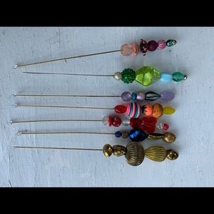 Set of 7 hat/lapel pins